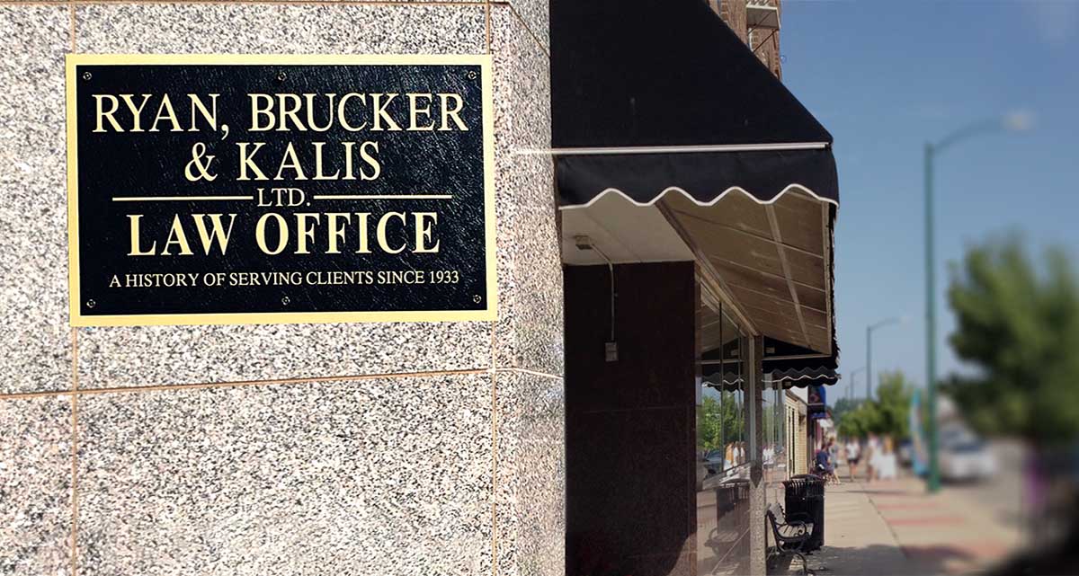 Exterior office photo with sign - Ryan, Brucker & Kalis, LTD. Law Office a history of serving clients since 1933